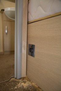 SPB_5D_095886 Installing an electric towel rail in a caravan - Faceplate fitted in place