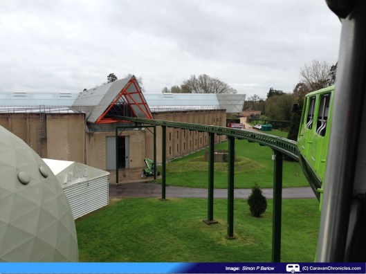 The momorail about to pass through the roof of the museum