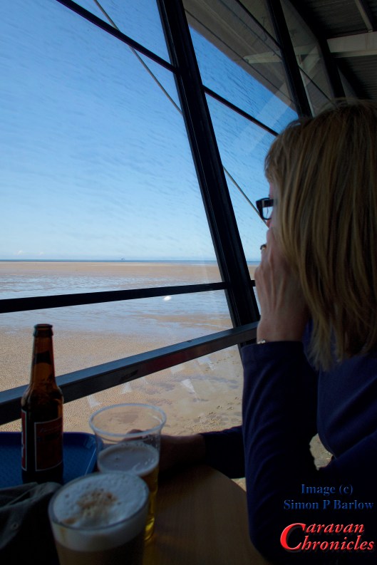 Sue watching the tide come in... well we think it was coming in it was so far away!