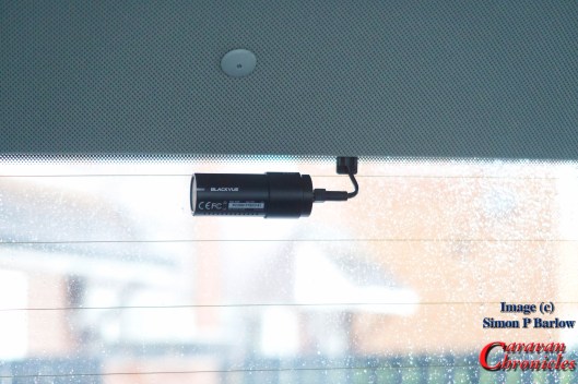 The rear camera is installed at the top of the window avoiding getting one of the heating elements in view